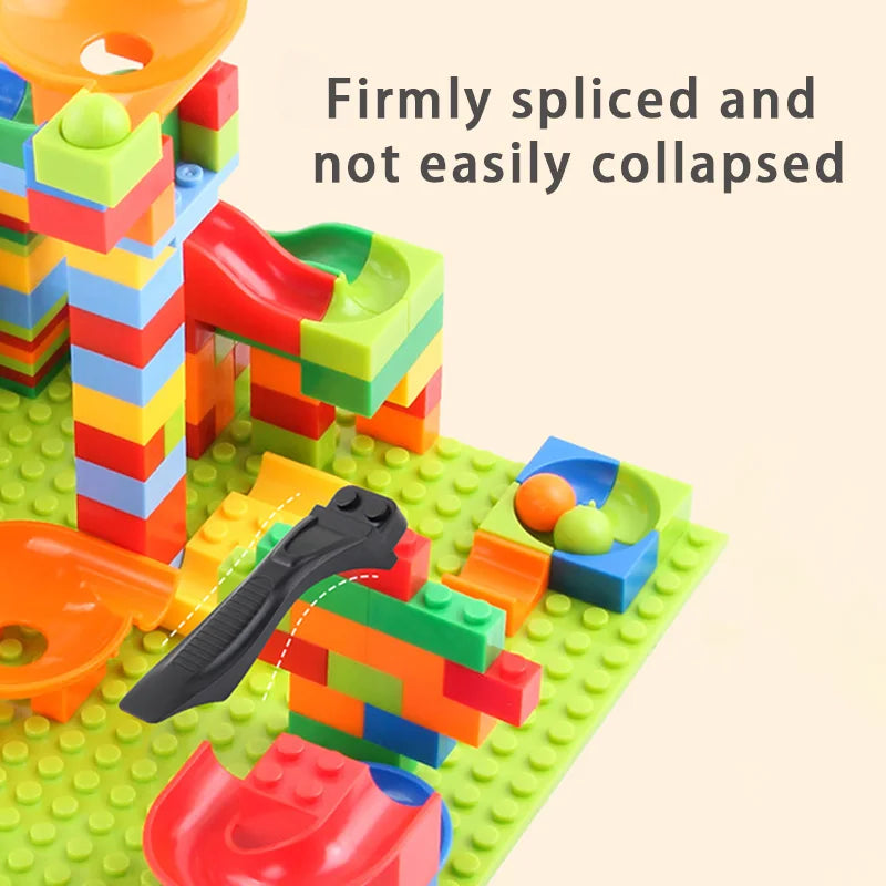 Supplier close-up of colorful micro-block track connections, slides and small rolling balls